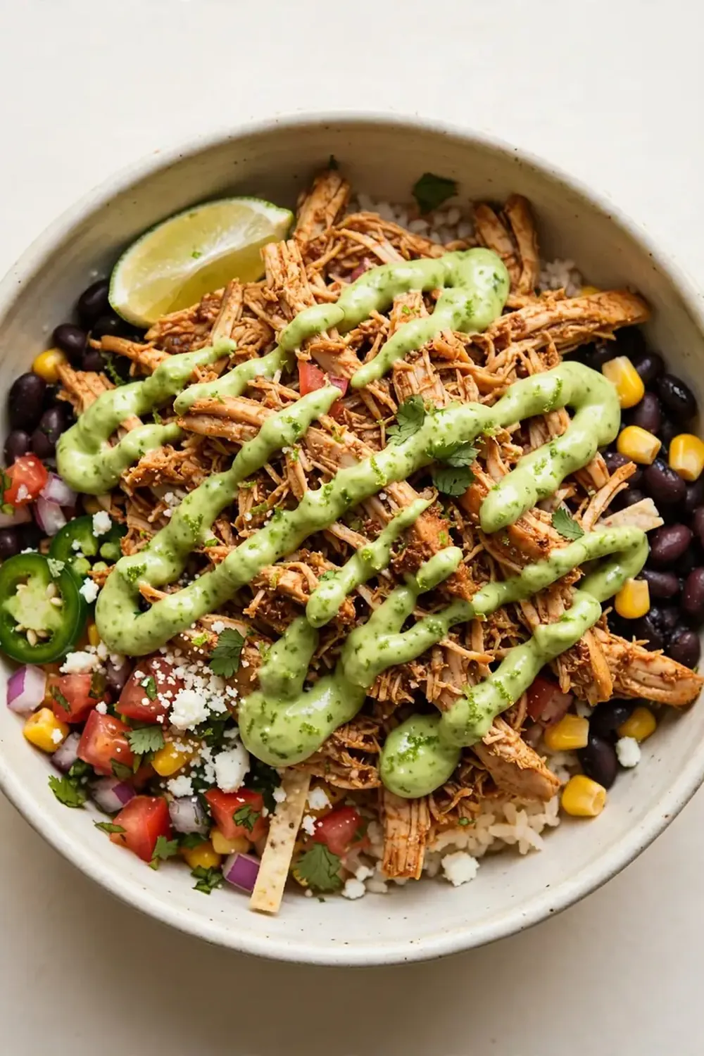 Shredded Mexican Chicken Bowls with Avocado Crema